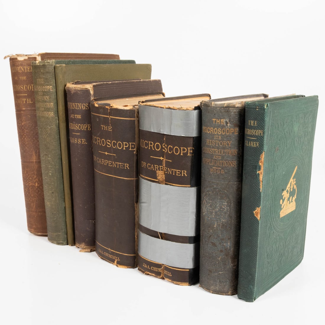Set of microscopy books.: Set of 7 books on microscopy, 19th and 20th century. Books include: CARPENTER, W., The Microscopy and it's Revelations, 2 copies from 1881 and one copy from 1856; CLARKE, L., A Descriptive catalogue