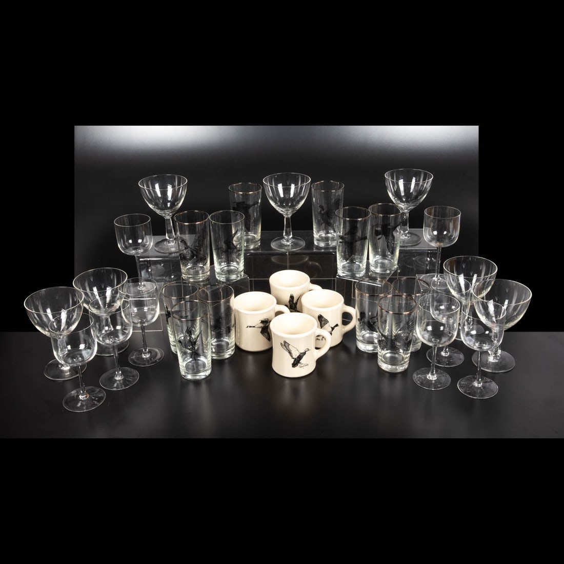 Group of Vintage Glass Barware: Group of Vintage Glass Barware, 20th Century, Comprising 12 transfer printed waterfowl highballs signed by Richard Bishop (including four mugs made by Victor Pottery); 8 unsigned contemporary design w