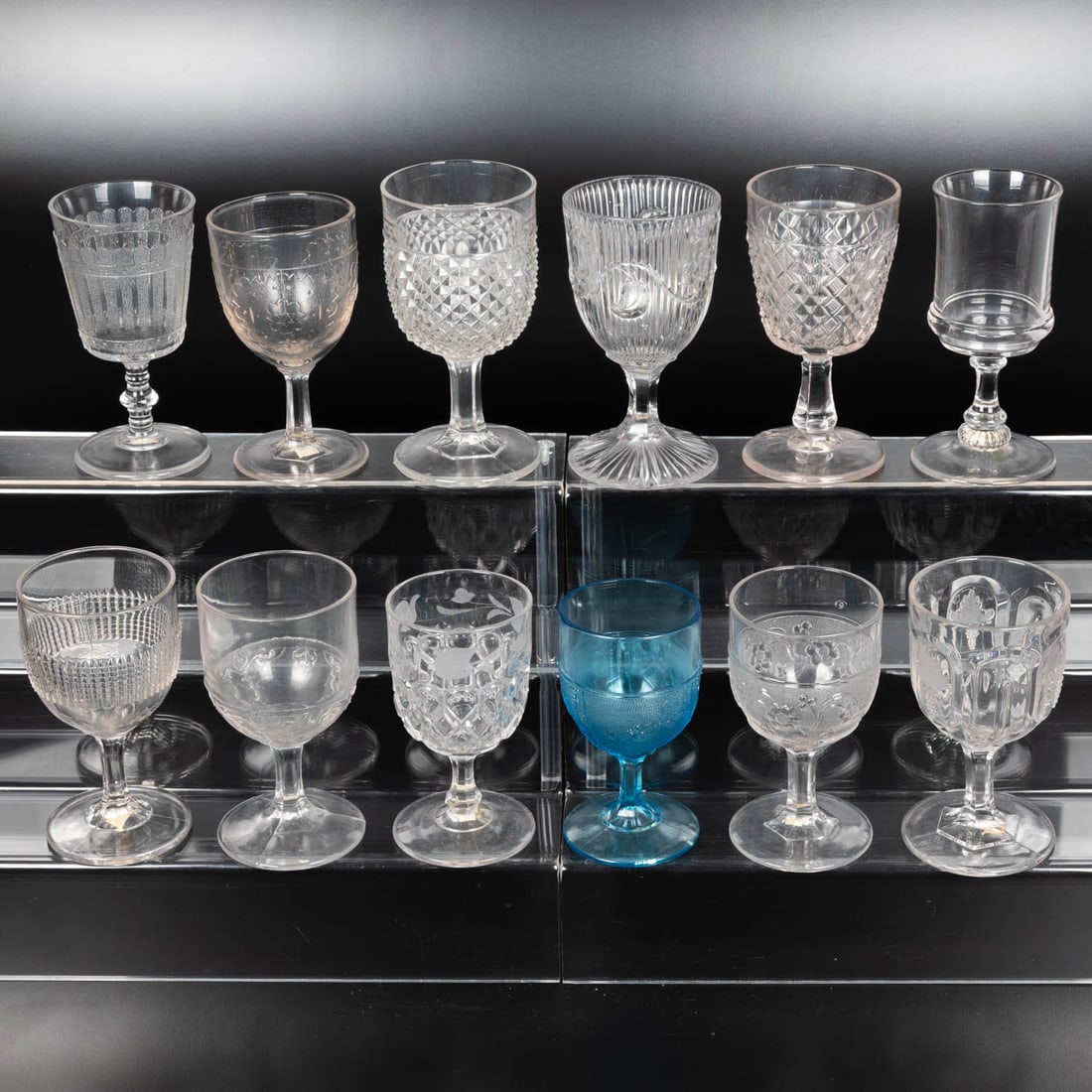 12 EAPG Pressed Glass Goblets: Twelve American Pressed Glass Goblets, 19th-20th Centuries, Having two, three (tri-mold) or four mold joints. Patterns Comprising: Siskyou, 1870's; Elmino, 1880's; Star-flower Band, 1870's; Magnet