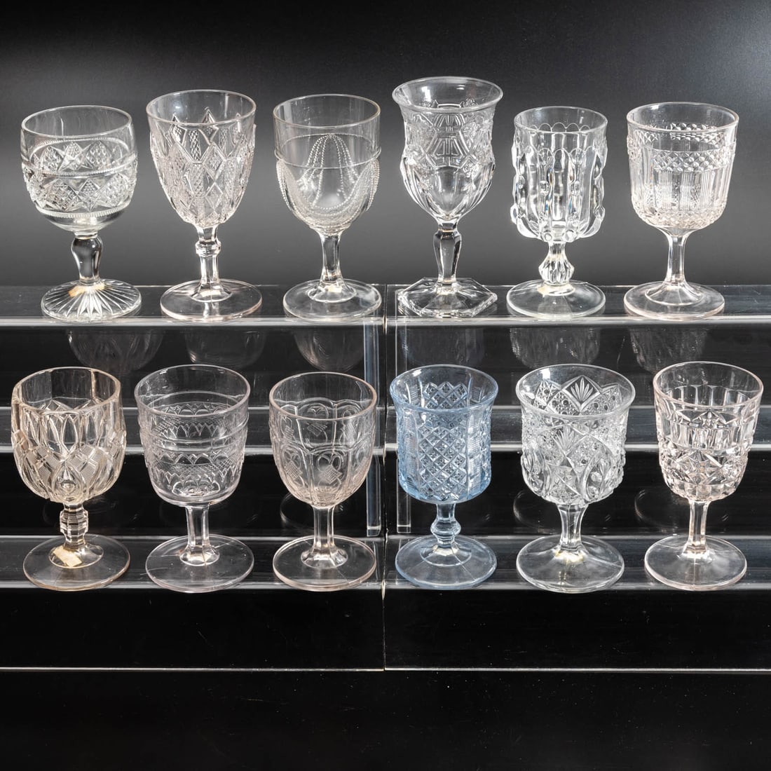 12 EAPG Pressed Glass Goblets: Twelve American Pressed Glass Goblets, 19th/20th Century, Having two, three (tri-mold) or four mold joints. Comprising: Pittman, 1880s; Diamond and Triangle Band, 1880s; Penelope, 1880s; Broken Column