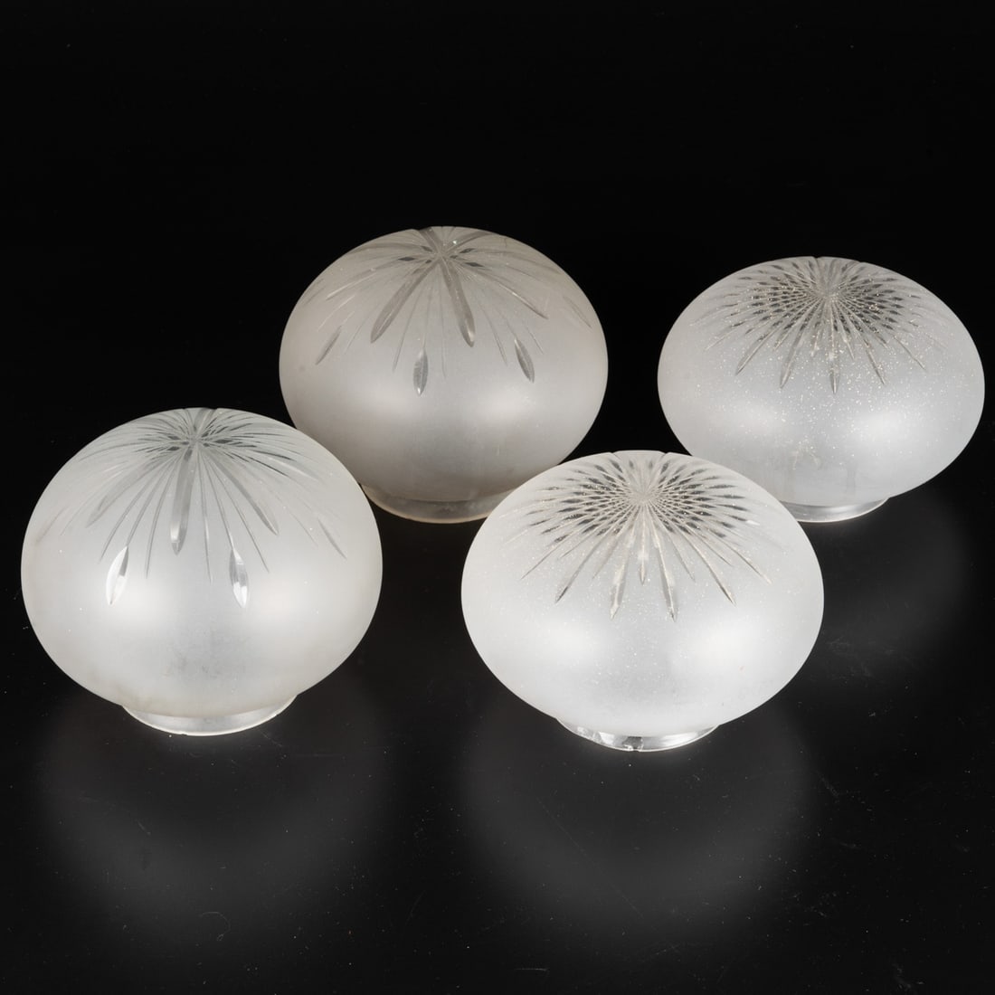Two Pairs of Frosted Glass Shades: Two Pairs of Frosted Glass Shades, 20th Century, Comprising coordinating pairs of frosted glass shades with cut glass starburst design. Opening 2 5/8 in. with the base rim being 3 1/8 in. in diameter.