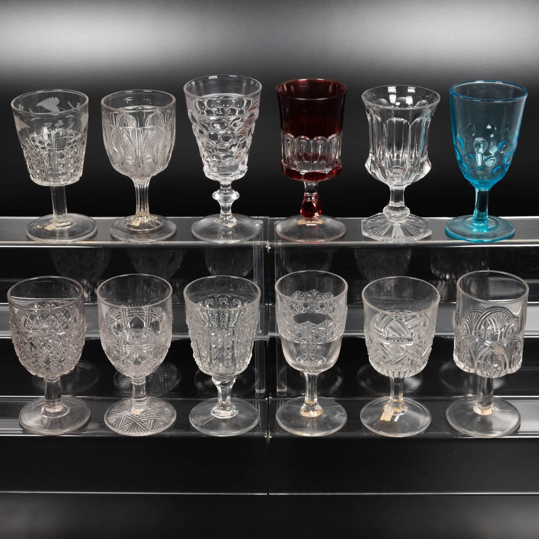 12 EAPG Pressed Glass Goblets: Twelve American Pressed Glass Goblets, 19th-20th Centuries, Having two, three (tri-mold) or four mold joints. Patterns Comprising: Ohio Inverted Thumbprint, late 1880's; Nail, 1891; Hundred Eye, 1880'