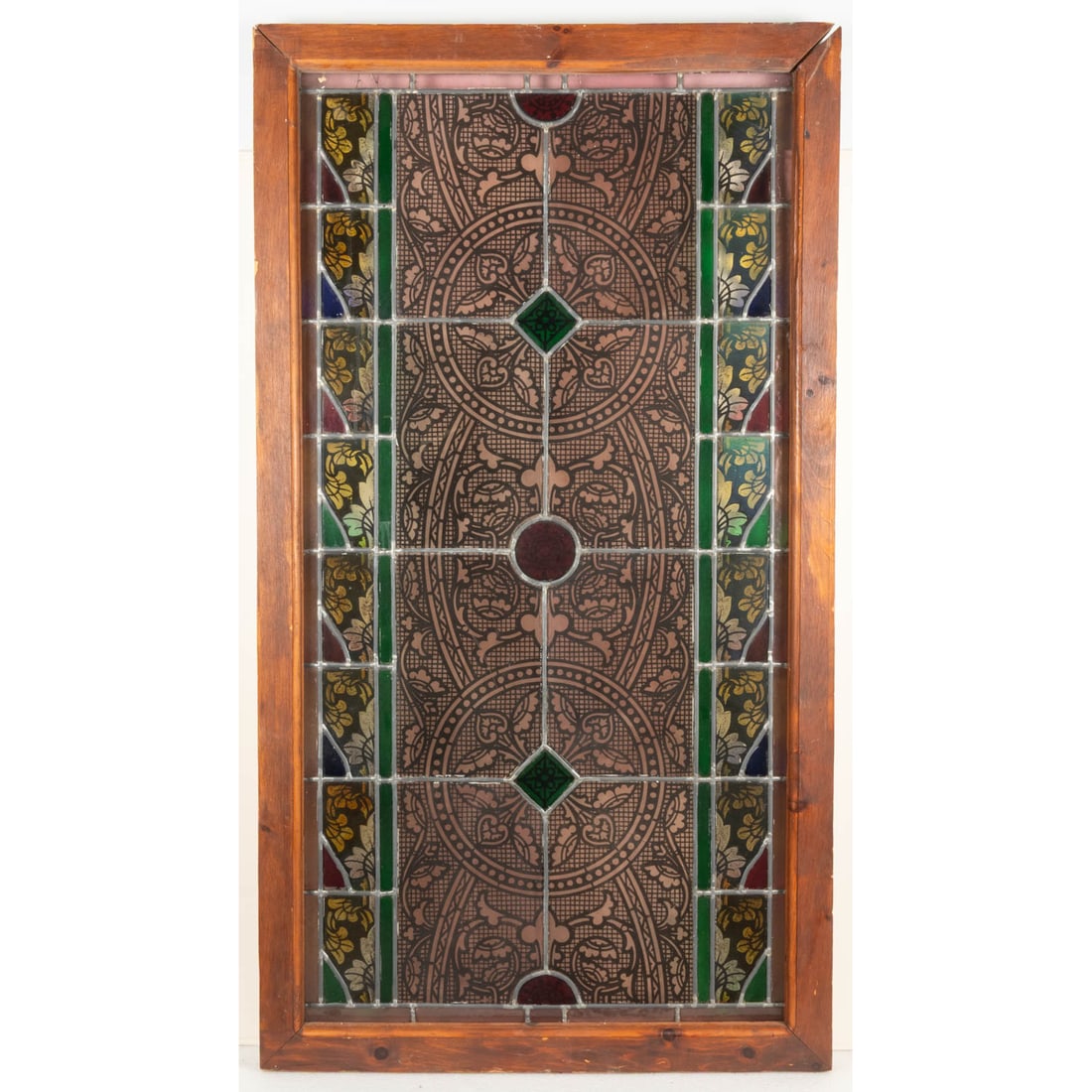 American Leaded Stained Glass Window: American Leaded Stained Glass Window, 20th Century. With eye-hooks attached to exterior face for mounting. H: 54 3/8 W: 30 1/8 D: 1 7/8 in.