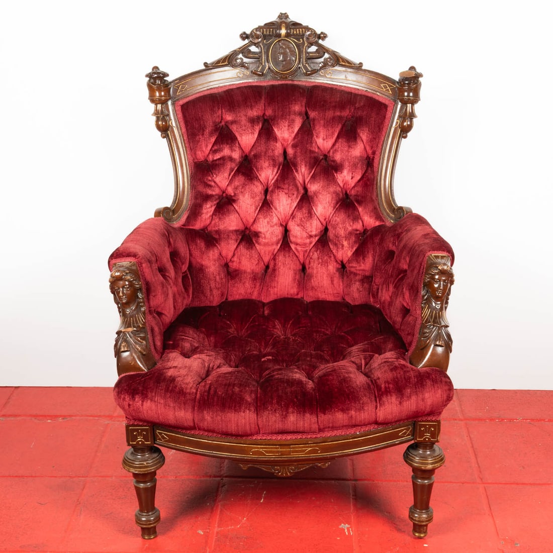John Jelliff (1813-1893) Renaissance Revival Carved Walnut Arm Chair: John Jelliff (1813-1893) Renaissance Revival Carved Walnut Armchair, 19th Century, Having tufted velvet upholstery and gilt painted decoration, carved classical female bust arm supports and back