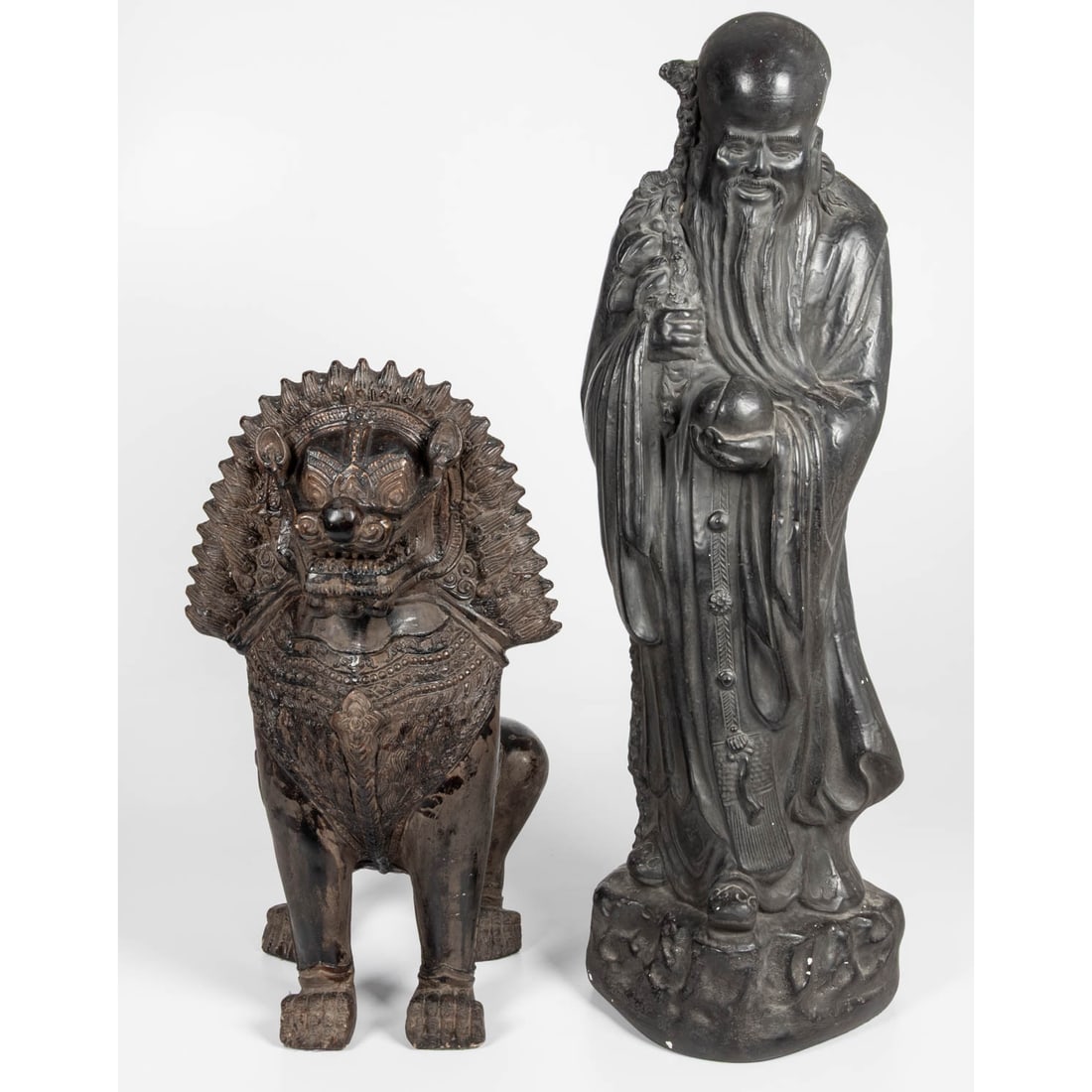 Two Cast Plaster Asian Museum Replicas: Two Cast Plaster Asian Museum Replicas, 20th Century, One depicting Chinese God of Longevity manufactured by Alvastone Museum Replicas. The other depicting a Thai Temple Guardian Lion Statue. 