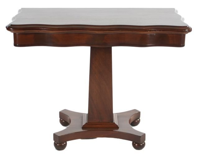 A Regency Style Mahogany Games Table, Early 20th Centur: A Regency Style Mahogany Games Table, Early 20th Century. Dimensions: h: 27 x w: 34 1/2 x d: 17 in. Other Notes: *** Please inquire for shipping estimate prior to bidding. Shipping costs may exceed it
