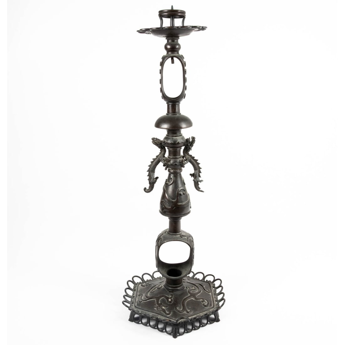 Japanese Shokudai or Temple Candlestick: Japanese Bronze Shokudai or Temple Candlestick, 20th Century, Patinated bronze, with dragon form decoration. H: 25 3/8 W: 9 1/2 in.