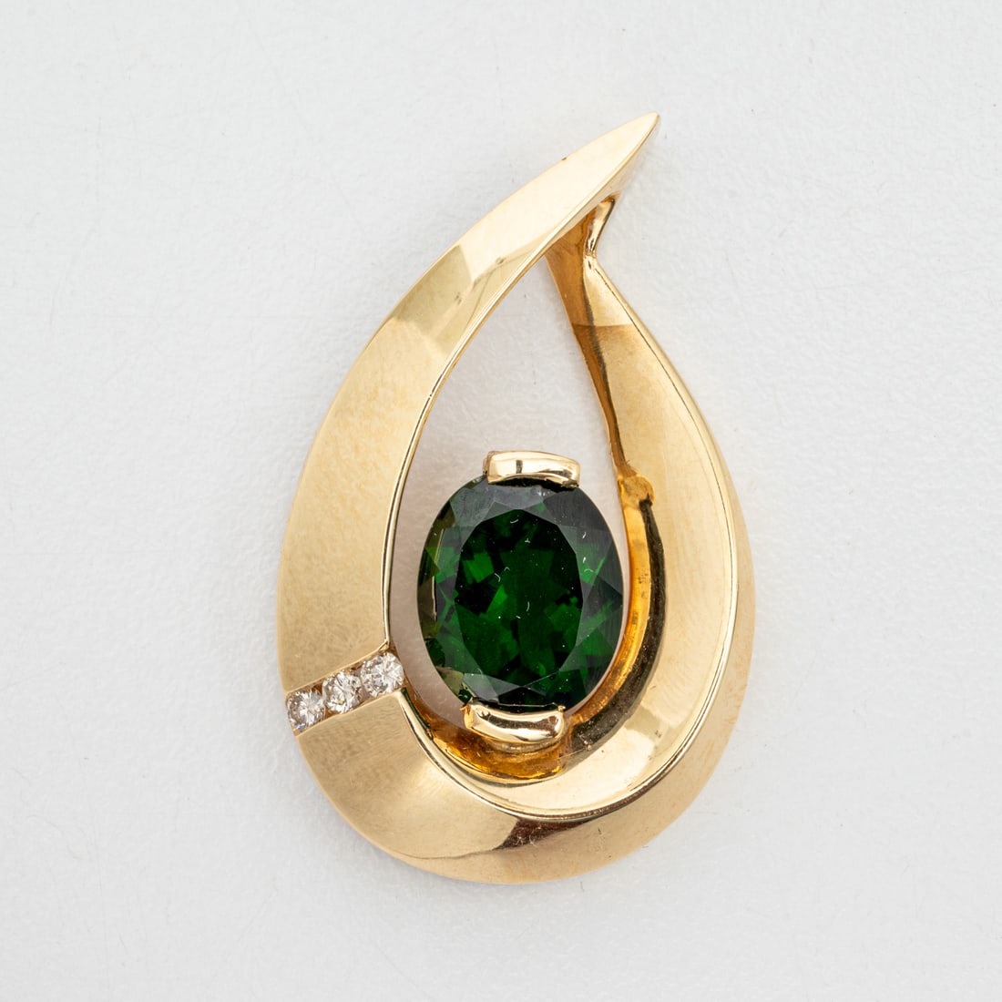14K Yellow Gold Green Chrome Tourmaline and Diamond Pendant: 14K Yellow Gold Green Chrome Tourmaline and Diamond Pendant, Set with One Oval Cut Green Chrome Tourmaline Natural Stone, Green Tourmaline stone approximately 3.75 cts. also set with three round