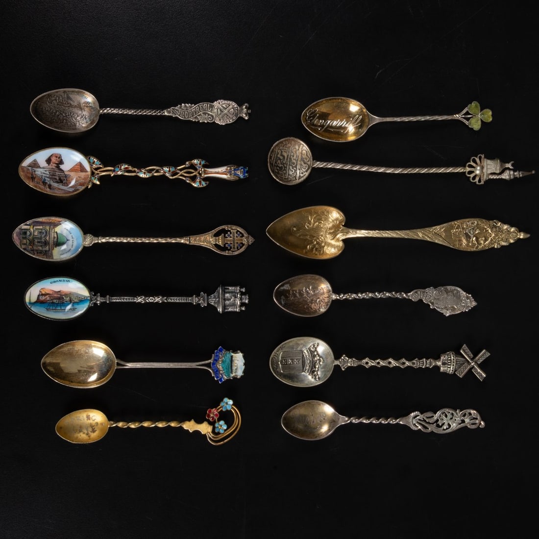 12 Silver and Sterling Silver Souvenir Spoons: 12 Silver and Sterling Silver Souvenir Spoons, 19th & 20th Century, From various locations including Egypt, Quebec, Montreal, Jerusalem, RMS Celtic, Glengarriff, Amsterdam & Spring Lake. Total aprox w