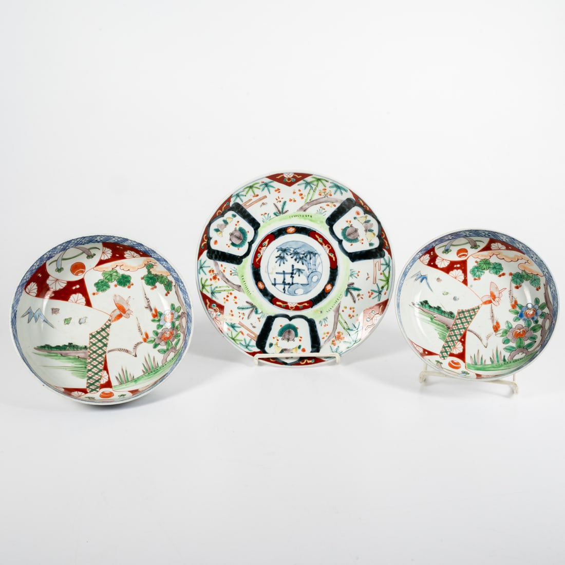 Three Japanese Imari Decorative Items: Three Japanese Imari Porcelain Decorative Items, Late Meiji Period. Comprising two bowls and a charger. Charger, Dia: 11 7/8 in. Bowl, H: 3 1/2 x Dia: 9 1/2 in. Bowl, H: 3 1/4 x Dia: 8 3/8 in.