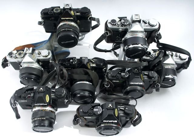 A Collection of Olympus OM SLR Cameras, 20th Century,: A Collection of Olympus OM SLR Cameras, 20th Century, Including one OM-4,one OM-4T, five OM-1's, one OM-2, two OM-2S's, two OM-2N's. Together with an Olypus-35 EC 2 with 42 mm lens and an Olympus Robo