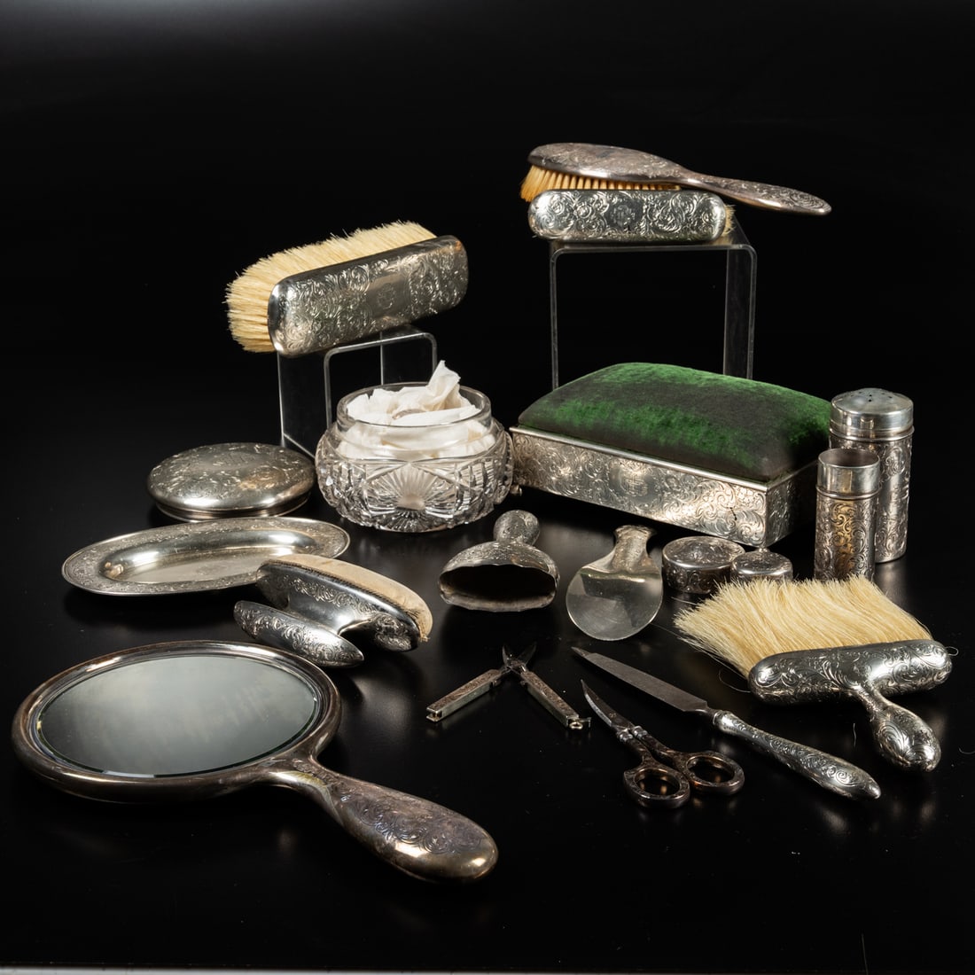 16 Piece Gorham Sterling Silver Ladies Dresser Set: 16 Piece Gorham Sterling Silver Ladies Dresser Set, 19th Century Comprising a padded jewelry box, cut crystal powder puff container, four brushes, hand mirror, tow silver containers, oval silver