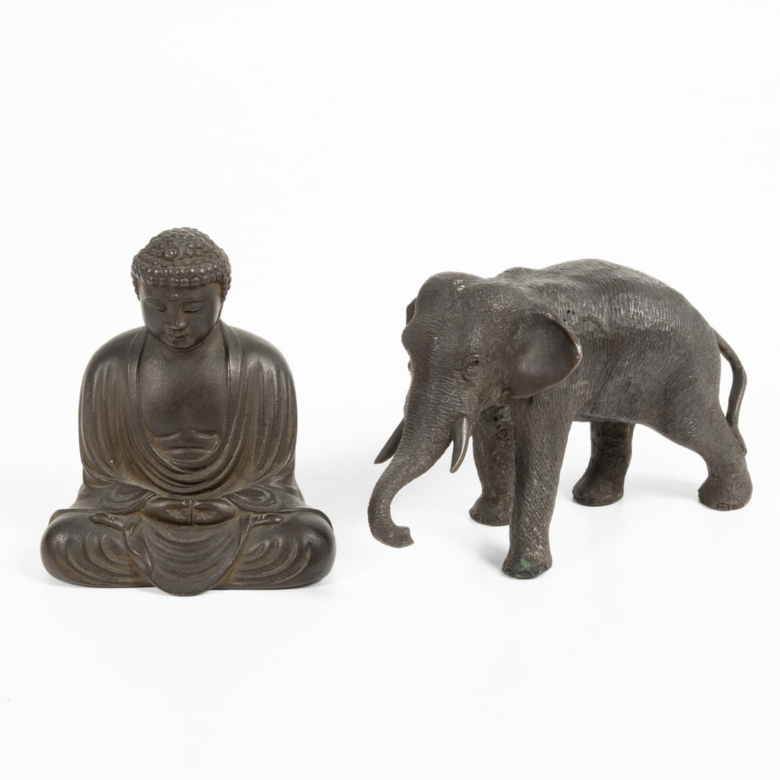 A Japanese Bronze Kamakura Buddha: A Japanese Bronze Kamakura Buddha, Signed Yoshimitsu, Meiji Period, Together with a bronze elephant, signed, Made by Genryusai Seiya Workshop, Meiji Period. Buddha dims, H: 3 1/2 x W: 3 x D: 2 in
