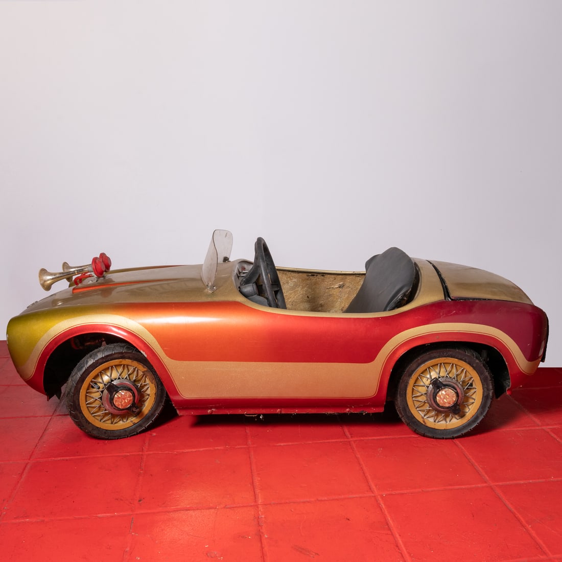 A Ferrari Bimbo Racer V12 Child's Car: A Ferrari Bimbo Racer V12 Child's Car, late 1950's Manufactured by Sila of Turin, Italy, originally known as the "Ferrarina", this child's Ferrari was styled by Giovanni Michelotti, based of the 375