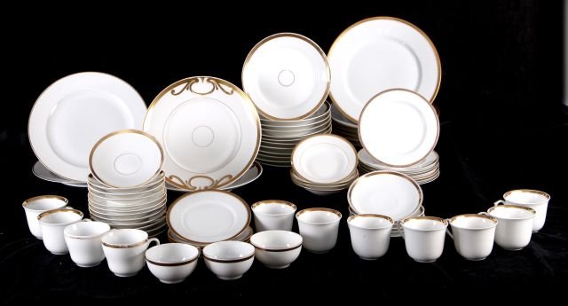 A Limoges Porcelain and Gilt Partial Dinner Service, 20: A Limoges Porcelain and Gilt Partial Dinner Service, 20th Century, Together with porcelain plates by various makers.
