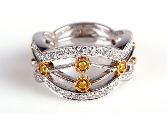 A Simon G. 18kt. White Gold and Diamond Ring,: A Simon G. 18kt. White Gold and Diamond Ring, Having forty-two bead set round brilliant cut diamonds, measuring 1.90-1.90 x 1.14mm. with a total approx. weight of 0.47ct, VS clarity and G color. Four