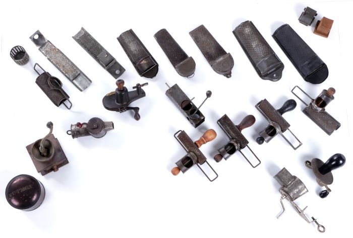 A Miscellaneous Collection of Tin Nutmeg Grinders,: A Miscellaneous Collection of Tin Nutmeg Graters, 19th/20th Century.