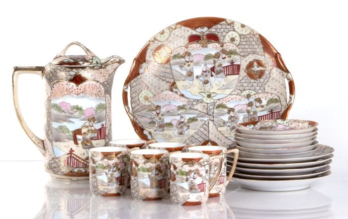 A Nippon Satsuma Porcelain Chocolate Set, 20th Century,: A Nippon Satsuma Porcelain Chocolate Set, 20th Century, Together with a brass vase. Dimensions: