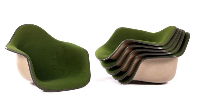 A Group of Six Charles and Ray Eames Upholstered: A Group of Six Charles and Ray Eames Upholstered Fiberglass Shells by Herman Miller, 20th Century, Each lacking legs, and stamped Herman Miller with original sticker. Dimensions: h: 17 1/2 x w: 25 x d