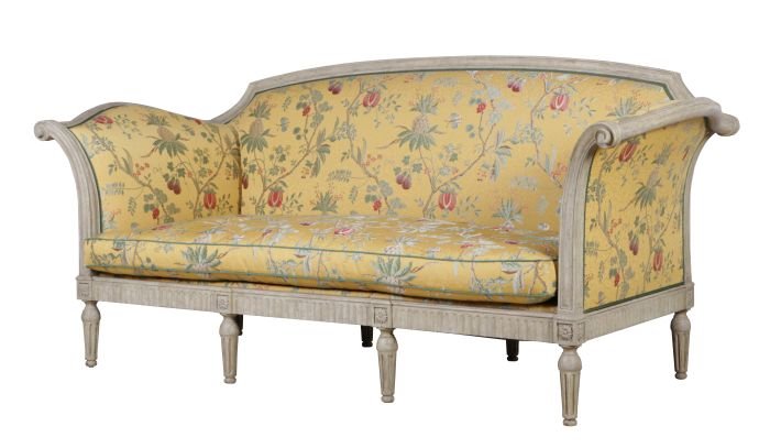 A Louis XVI Style Canapé by Dennis & Leen Upholstered: A Louis XVI Style Canapé by Dennis & Leen Upholstered in Colefax by Fowler Fabric, 20th Century. Dimensions: h: 39 1/2 x w: 86 1/2 x d: 35 in.