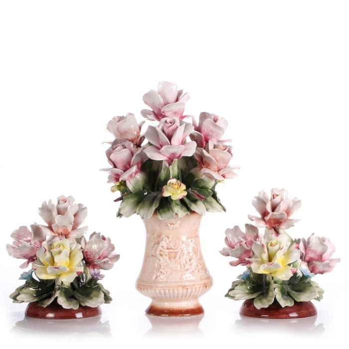 A Group of Three Capodimonte Porcelain Floral Form: A Group of Three Capodimonte Porcelain Floral Form Bouquets, 20th Century. Largest Dimensions: h: 14 1/2 x w: 9 x d: 9 in.