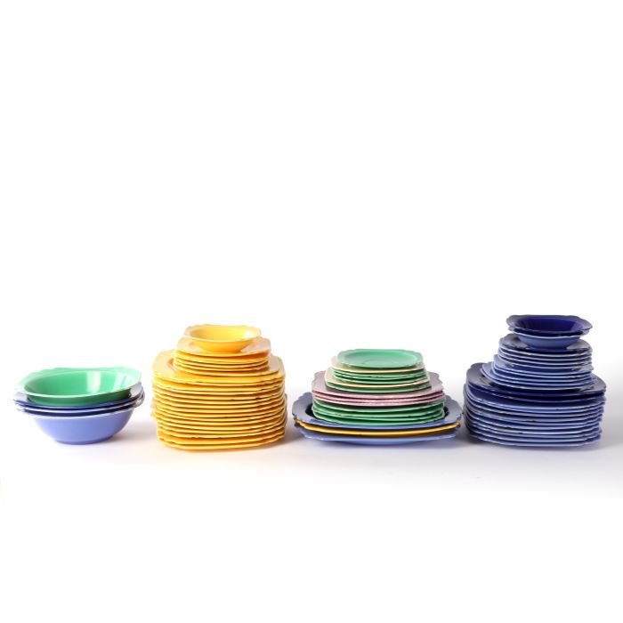 A Miscellaneous Collection of Fiestaware Style Glazed: A Miscellaneous Collection of Fiestaware Style Glazed Porcelain Serving Items, 20th Century.