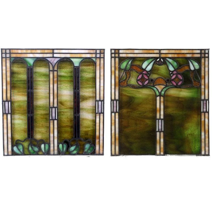 A Pair of Slag and Stain Glass Windows Depicting: A Pair of Slag and Stain Glass Windows Depicting Flowers and Architectural Elements, 20th Century. Dimensions: h: 20 1/2 x w: 19 1/2 in.