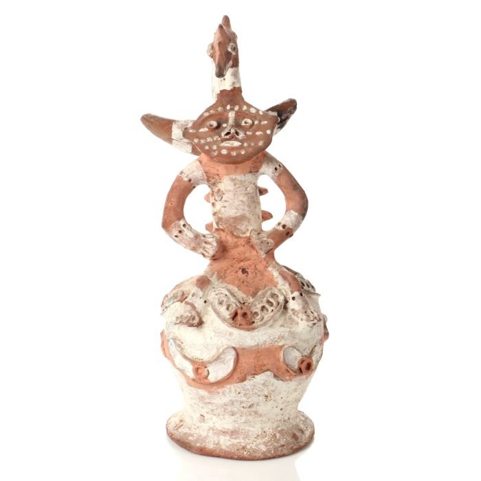 A Sepik River Tribe Painted Earthenware Figure: A Sepik River Tribe Painted Earthenware Figure Surmounted by a Bird Form, Papua New Guinea, 20th Century. Dimensions: h: 16 x w: 6 1/2 x d: 9 1/2 in. Provenance: The Collection of Ann and Norman Roule