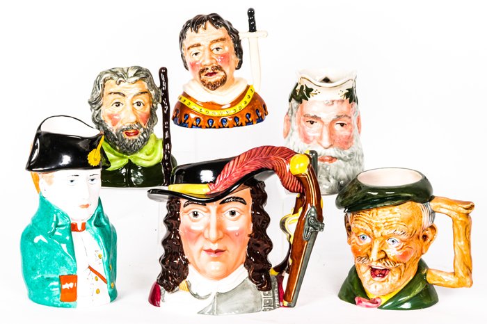 A Collection Six Porcelain Character Jugs by Various: A Collection Six Porcelain Character Jugs by Various Makers, 20th Century, Including pieces by Staffordshire (Sheriff of Nottingham and Little John) and Franklin Porcelain Studio (Admiral Benbow). Lar
