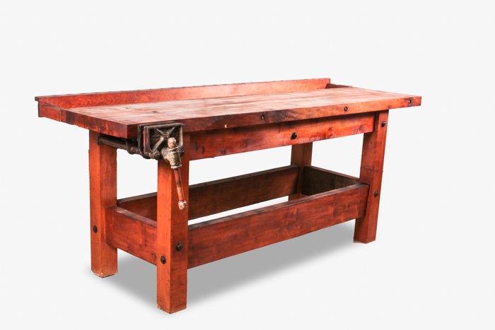 An American Stained Hardwood Work Table with a: An American Stained Hardwood Work Table with a Columbian Cleveland Vice, 20th Century. Dimensions: h: 36 x w: 84 1/4 x d: 35 1/2 in.
