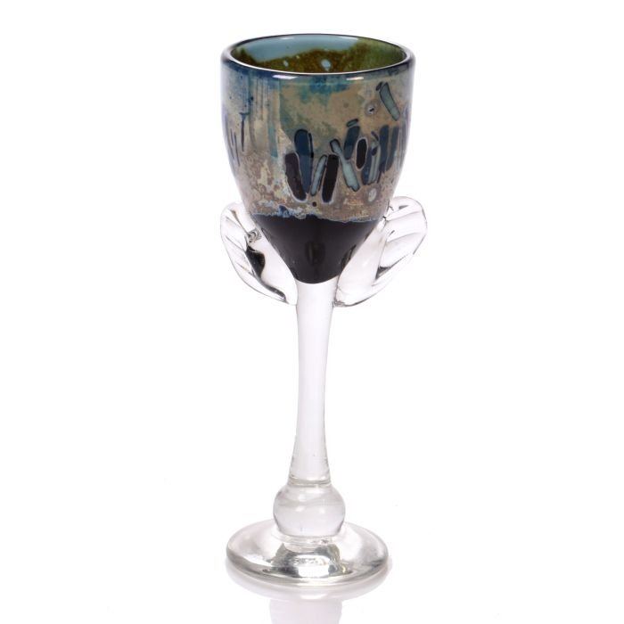 A Clear and Colored Glass Goblet by a Cleveland Art: A Clear and Colored Glass Goblet by a Cleveland Art Institute Alumnus, 20th Century. Dimensions: h: 9 1/4 x dia: 3 1/4 in. Provenance: The Collection of Ann and Norman Roulet. Other Notes: Proceeds to