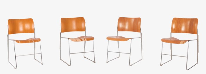 A Group of Four David Rowland 40/4 Laminated Wood on: A Group of Four David Rowland 40/4 Laminated Wood on Chrome Frame Stacking Chairs, 20th Century. Dimensions: h: 23 x w: 18 x d: 21 in.