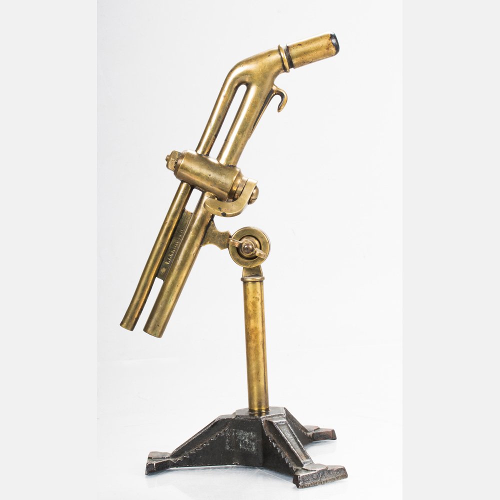 A Laboratory Blowpipe Labeled Fletcher Russell and Co.: A Laboratory Blowpipe Labeled Fletcher Russell and Co. on Stand, Late 19th/Early 20th Century. Possibly used in combination with a foot powered bellows to supply air with the gas, which is being suppl