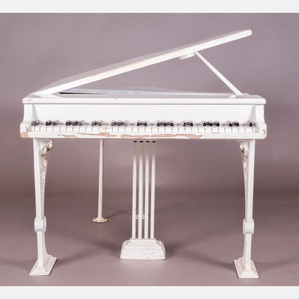 A Diminutive Painted Hardwood Faux Piano, ca. 1981.: A Diminutive Painted Hardwood Faux Piano, ca. 1981. A prop from the 1981 release of 'Pennies from Heaven.' H: 27 W: 36 D: 37 in.