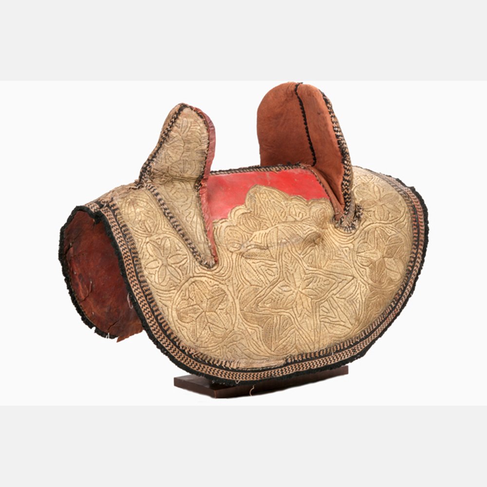 A Traditional Arabian Style Leather and Embroidered: A Traditional Arabian Style Leather and Embroidered Saddle, 20th Century.