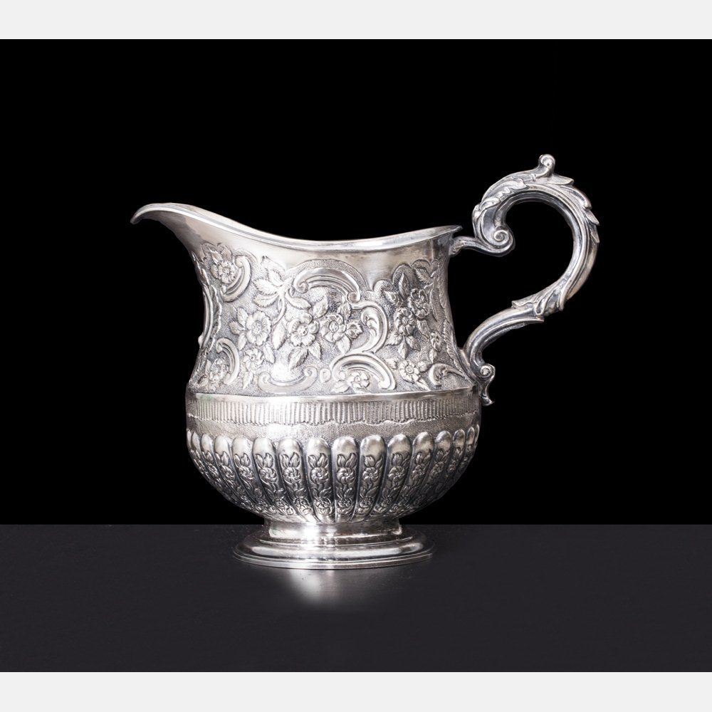 An English Sterling Silver Repoussé Pitcher with Full (1 of 10)
