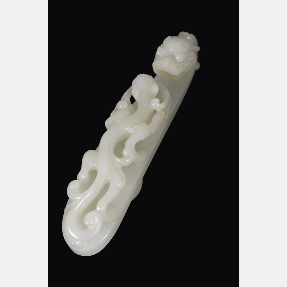 A Chinese Carved White Jade Dragon Form Belt Hook, (1 of 6)