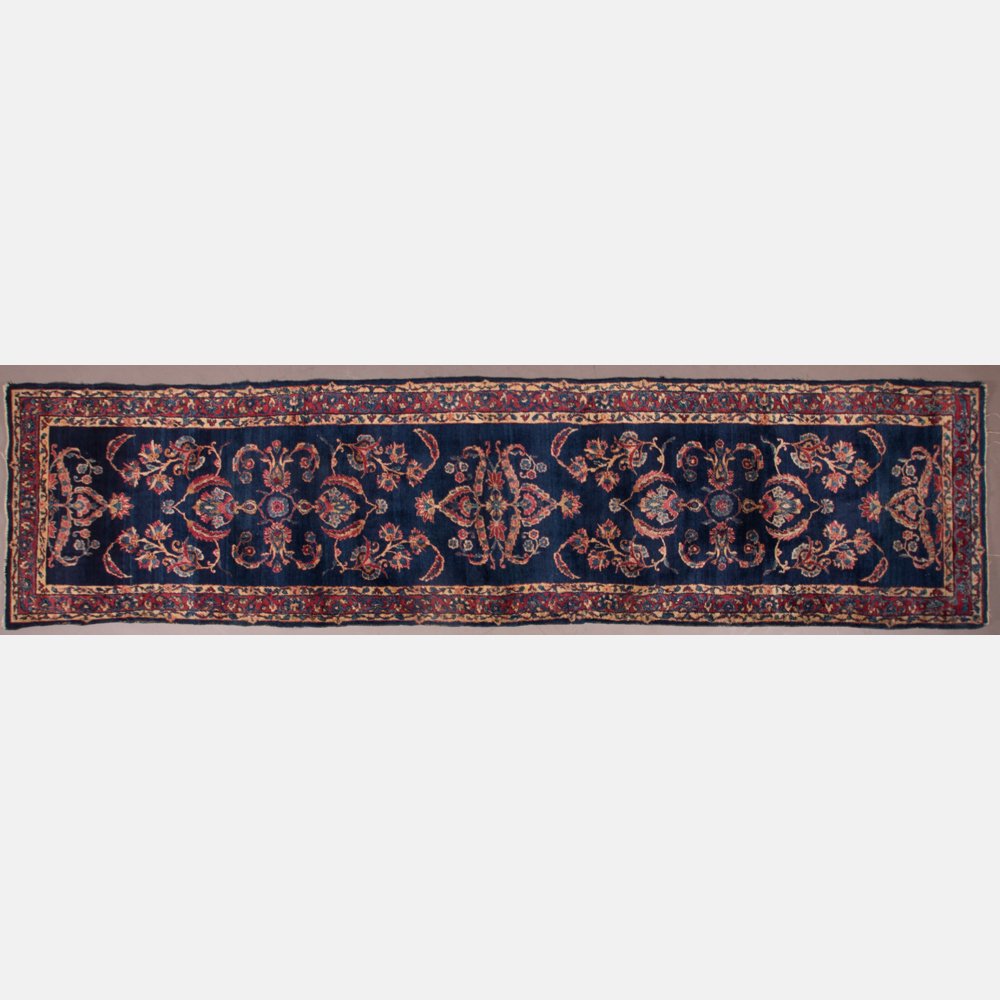 A Blue Sarouk Wool Runner, 20th Century. (1 of 8)