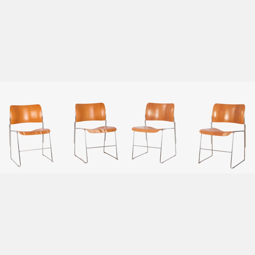 A Group of Four David Rowland 40/4 Laminated Wood on: A Group of Four David Rowland 40/4 Laminated Wood on Chrome Frame Stacking Chairs, 20th Century. H: 23 W: 18 D: 21 in.