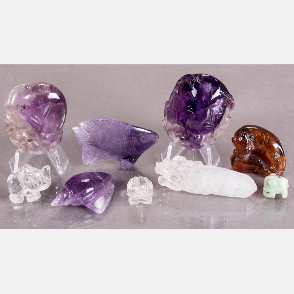 A Group of Chinese Carved Amethyst, Amber and Rock: A Group of Chinese Carved Amethyst, Amber and Rock Crystal Animal Forms. Largest dimensions: h: 1 3/8 x w: 1 1/2 x d: 3/4 in.