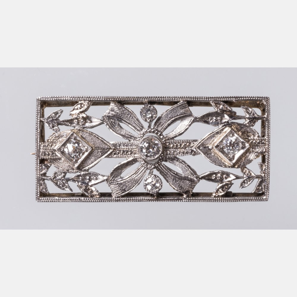 A Platinum and Diamond Brooch, (1 of 3)