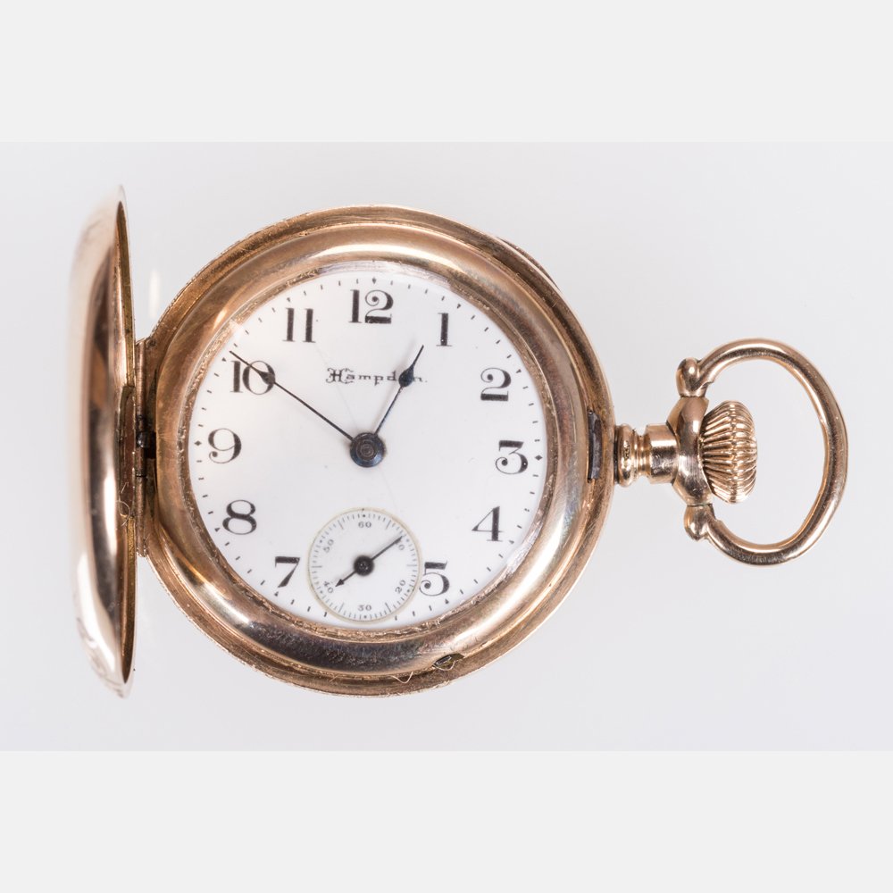 A Hampden Gold Plated Ladies Pocket Watch, 20th: A Hampden Gold Plated Ladies Pocket Watch, 20th Century, Numbered 6052792, Dueber special. Total weight: 21.8 dwt. D: 1 1/4 in.