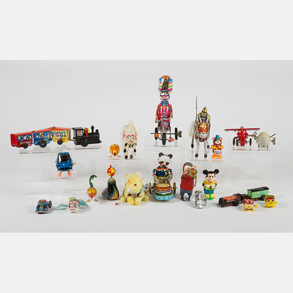 A Miscellaneous Collection of Vintage Tin Wind-Up Toys,: A Miscellaneous Collection of Vintage Tin Wind-Up Toys, 20th Century, Including pieces by Tomy, Yone Lehmann, Schylling, Walt Disney and others. Largest dimensions: h: 8 x w: 3 1/2 x d: 4 in.