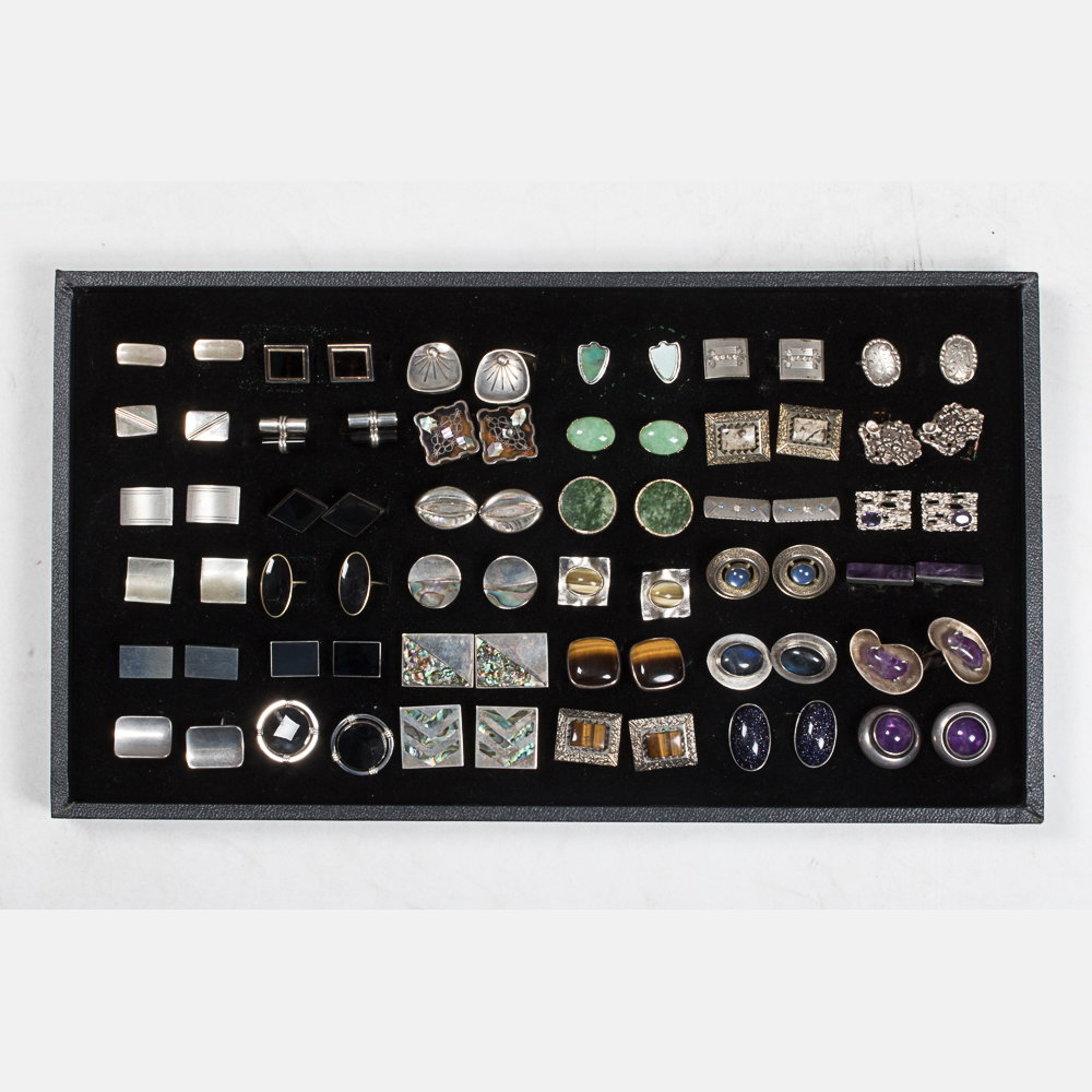 A Miscellaneous Collection of Thirty-Six Pairs of: A Miscellaneous Collection of Thirty-Six Pairs of Sterling Silver, Silver and Silver Plated Cufflinks by Various Makers, 20th Century, Including pairs with amethyst, tigers eye, mother-of-pearl, black