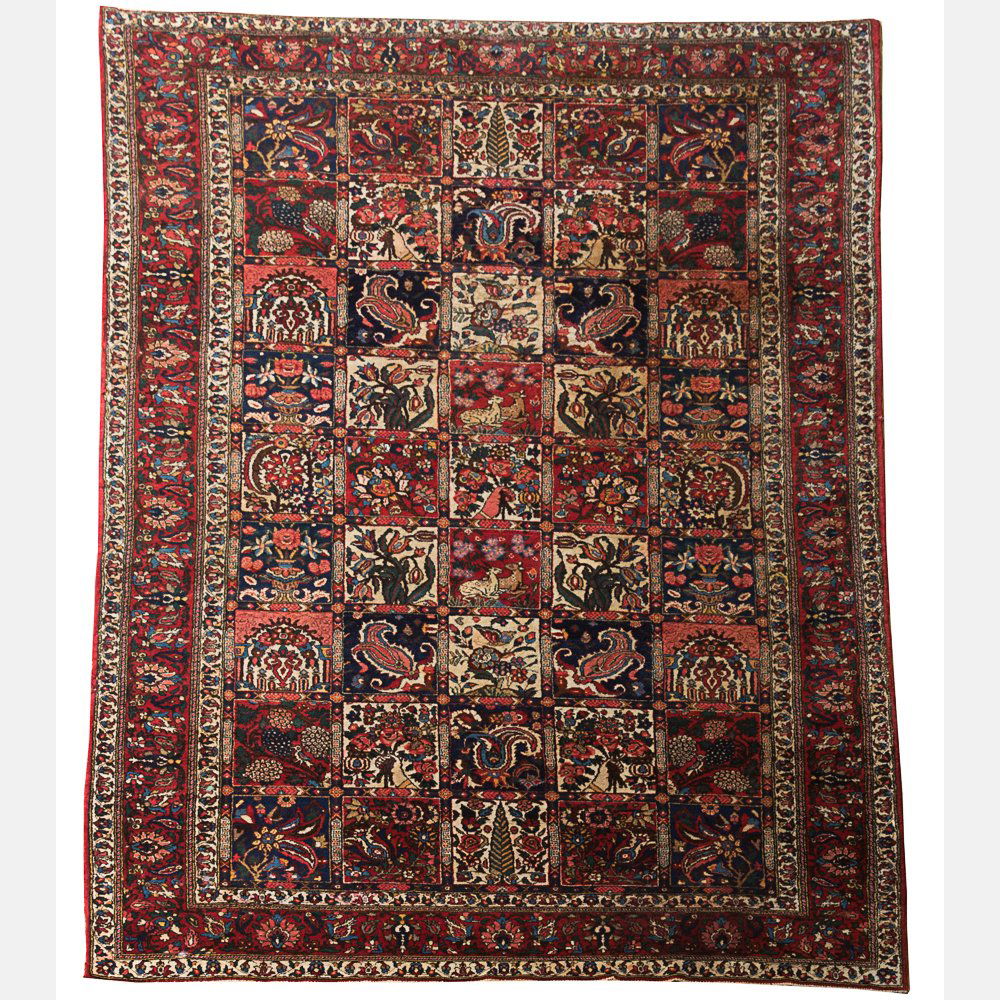 A Bakhtiari Wool Rug, 20th Century. (1 of 1)