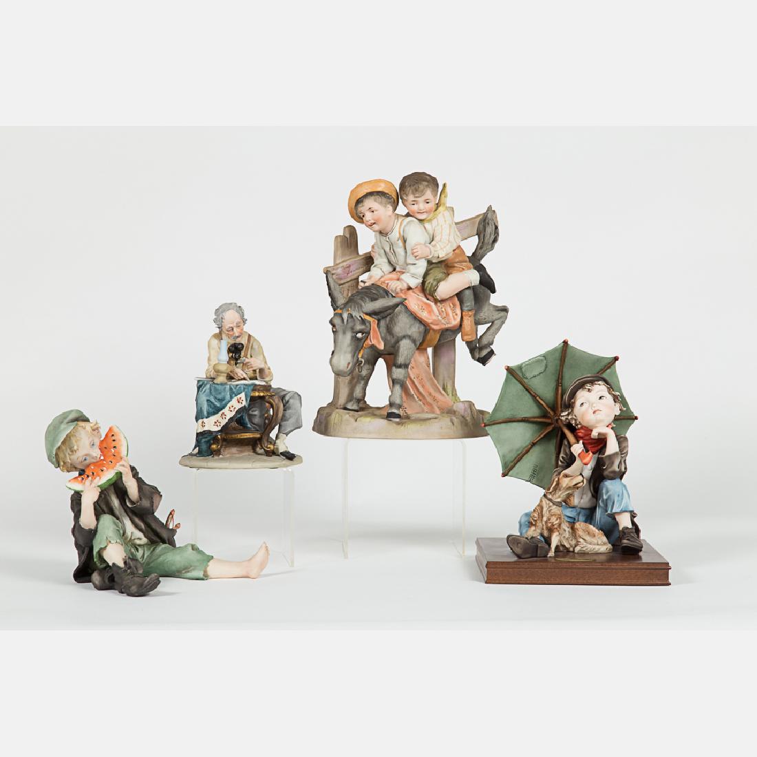 A Group of Four Italian Ceramic and Porcelain Figurines (1 of 9)