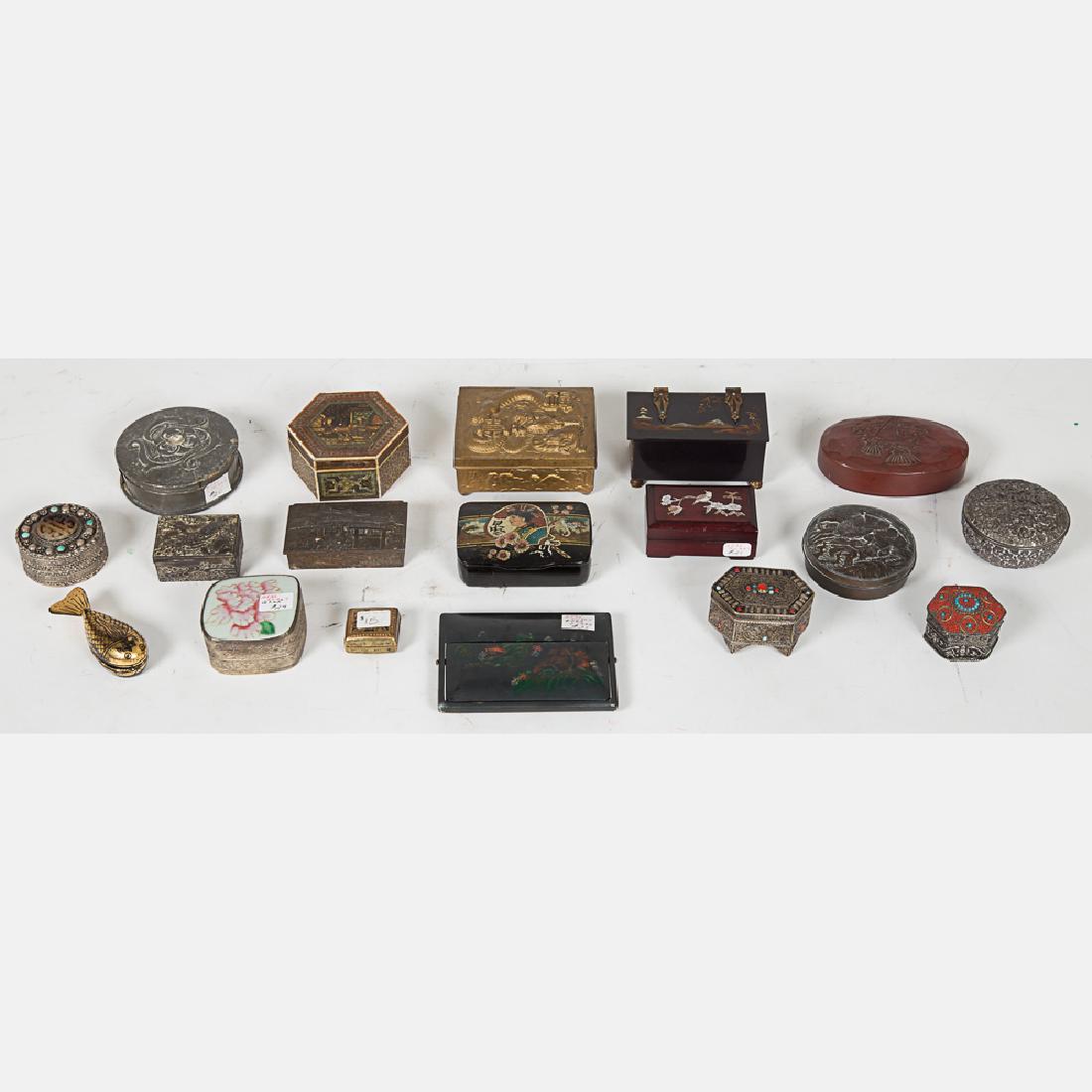 A Miscellaneous Collection of Asian Brass, Metal and: A Miscellaneous Collection of Asian Brass, Metal and Wood Decorative Boxes, 19th/20th Century. Largest dimensions: h: 1 1/2 x w: 3 1/4 x d: 4 in. From the Estate of Terrence W. Burke.
