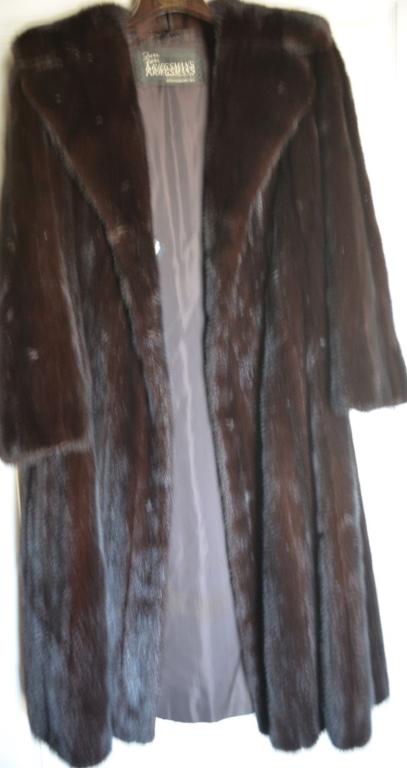 New Dark Mink 3/4 Length Coat: This is a spectacular, new with tags mink coat from Kriegman's Furs of North Carolina. This rich and plush, dark brown mink coat shows absolutely no wear. This is your opportunity to own a fine mink c