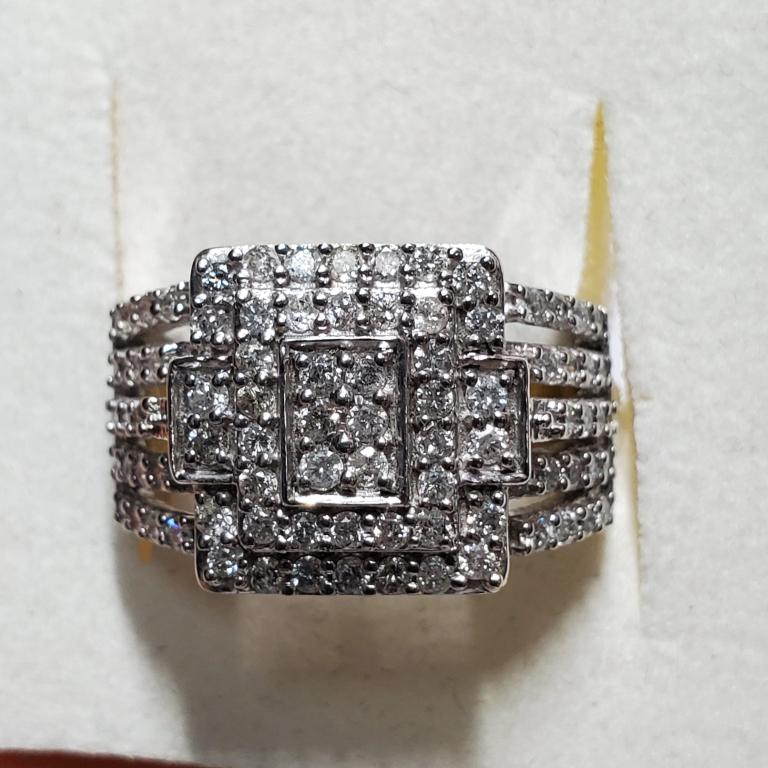 $7800 10K Diamond(1ct) Ring PN 152: 10K White Gold Diamond(1ct) Ring (~Size 6.5) (~weight 7.3g), Made in Canada, Appraised Retail $7800. Brand new in the box with appraisal.