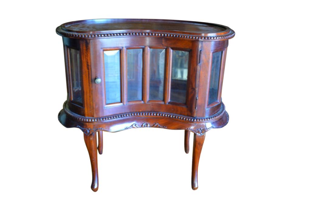 Kidney Shaped Mahogany Chocolate Table: Fine Kidney shaped, solid, hand carved, mahogany chocolate table. Beveled glass surrounds the case with one door opening for display, carved apron, cabriole legs. Clean, solid condition with very mino